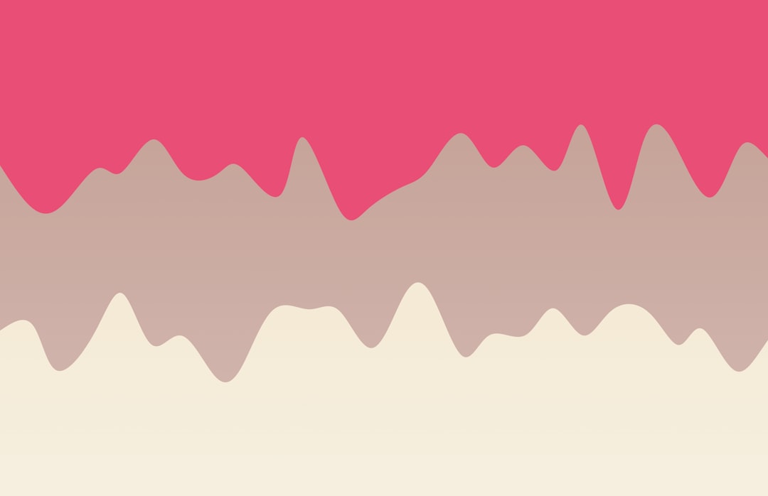 A pink and white abstract background with a subtle line of mountains