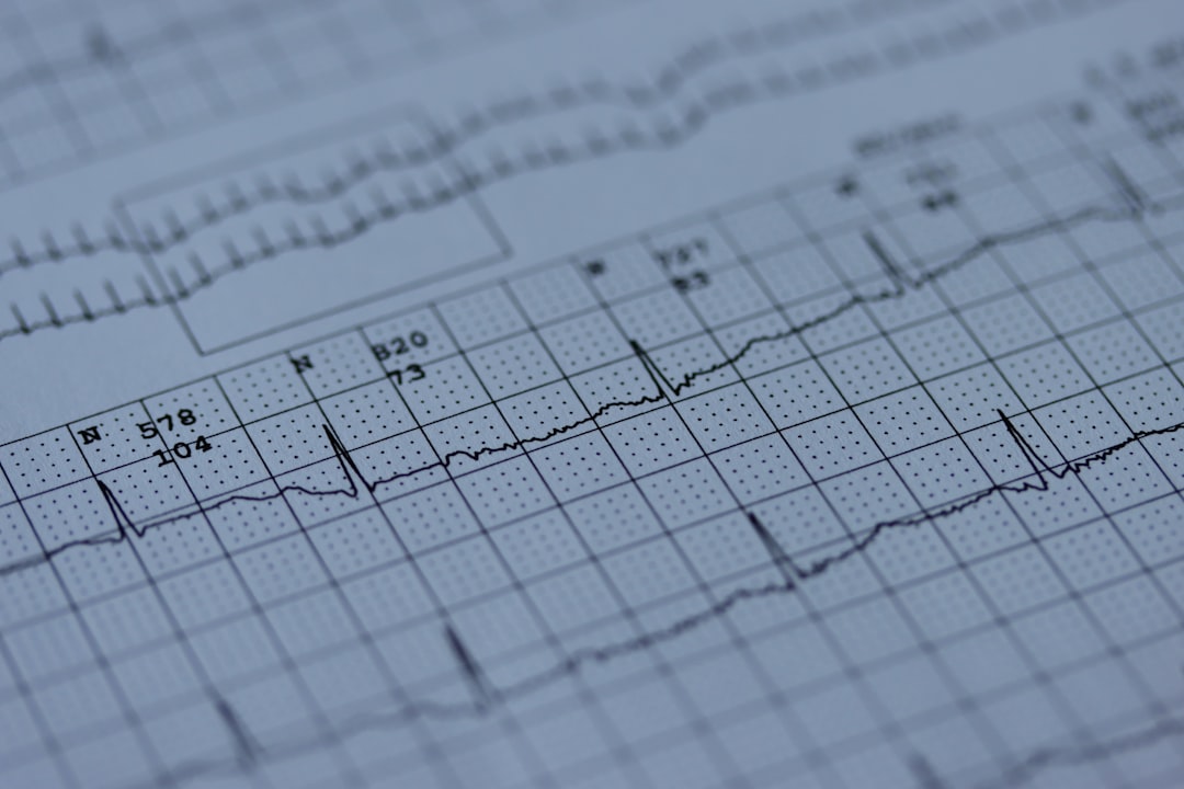 A close up of a medical paper with a blood pressure graph on it